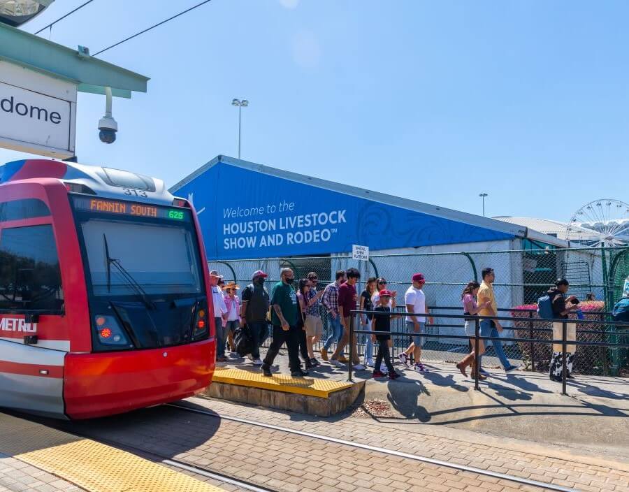 METRORail riders disembarking at the Stadium Park / Astrodome station along the Red Line to attend the Houston Livestock Show and Rodeo